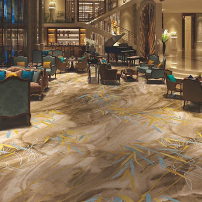 Example of a patterned broadloom carpet installed in a hotel lobby