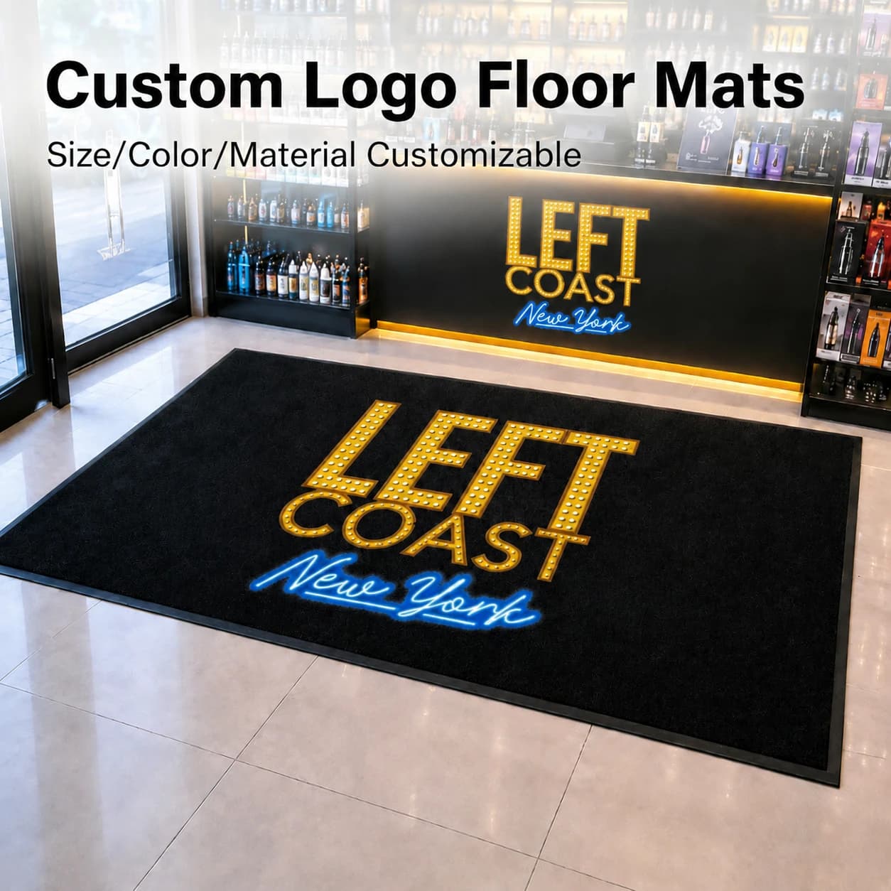 Black custom logo floor mat with bold yellow and blue lettering in front of a shop counter